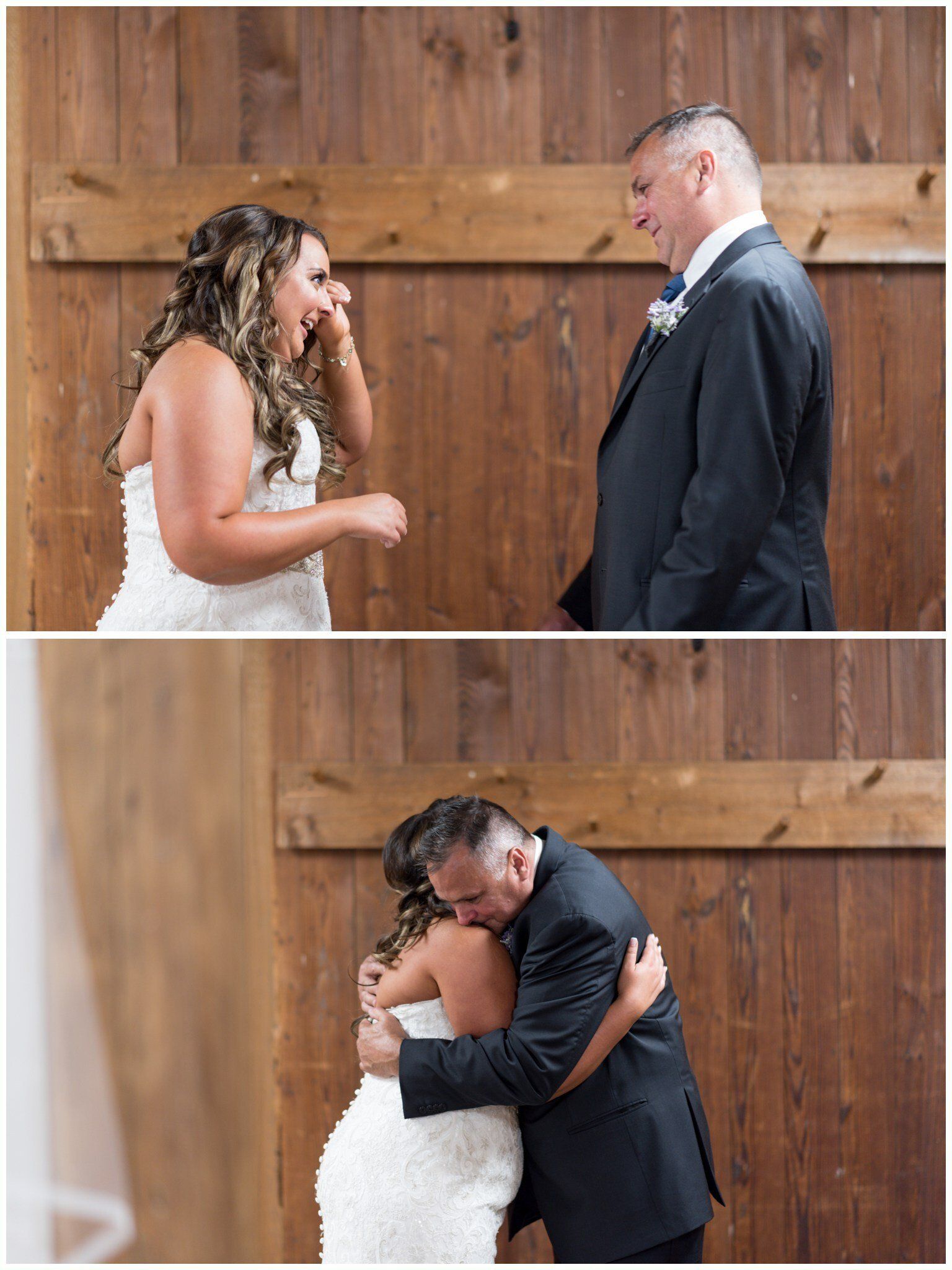 Bride and groom sharing an emotional hug in front of a wooden barn door