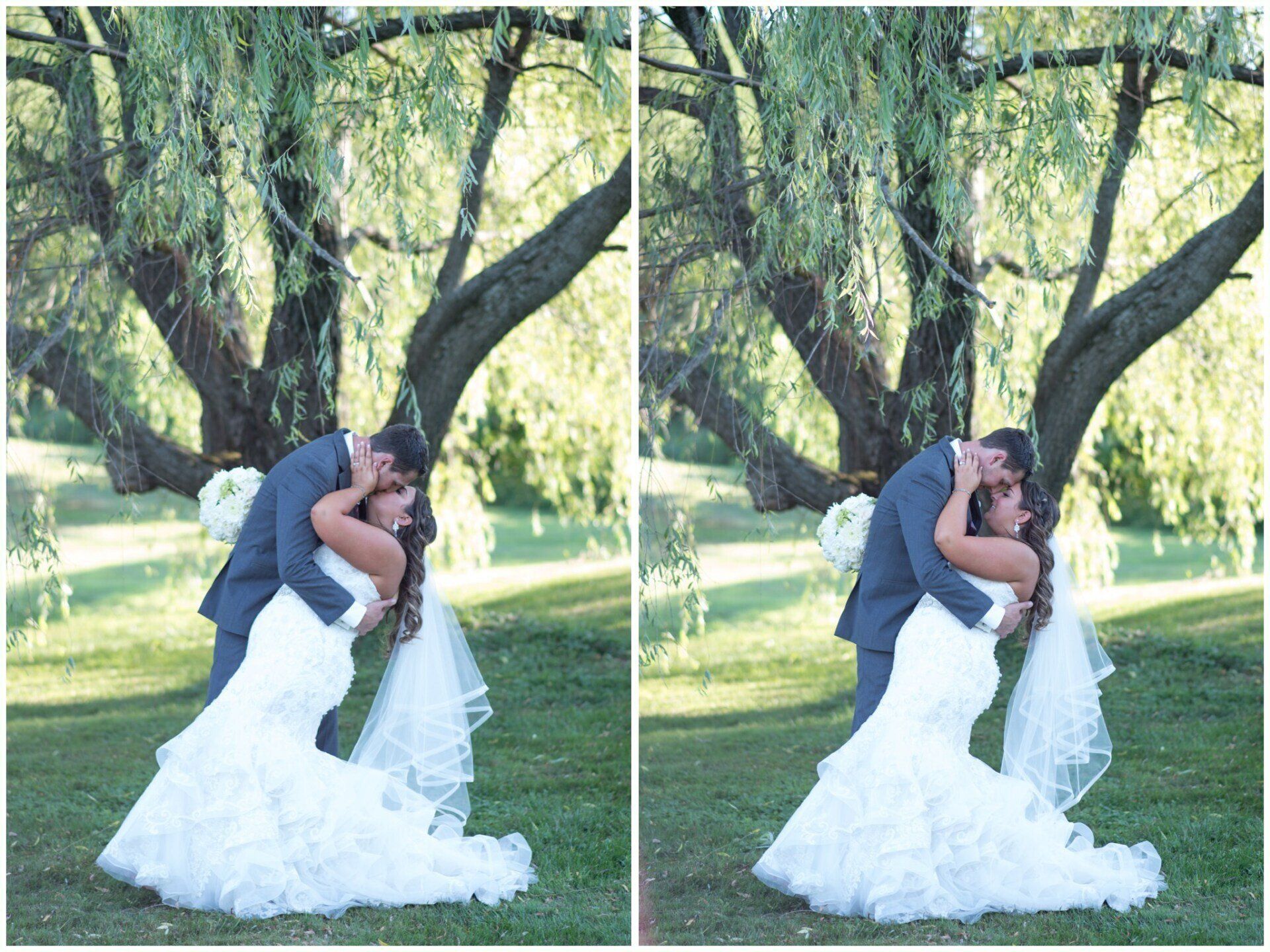 Bride and groom embracing under a large tree in a grassy outdoor setting