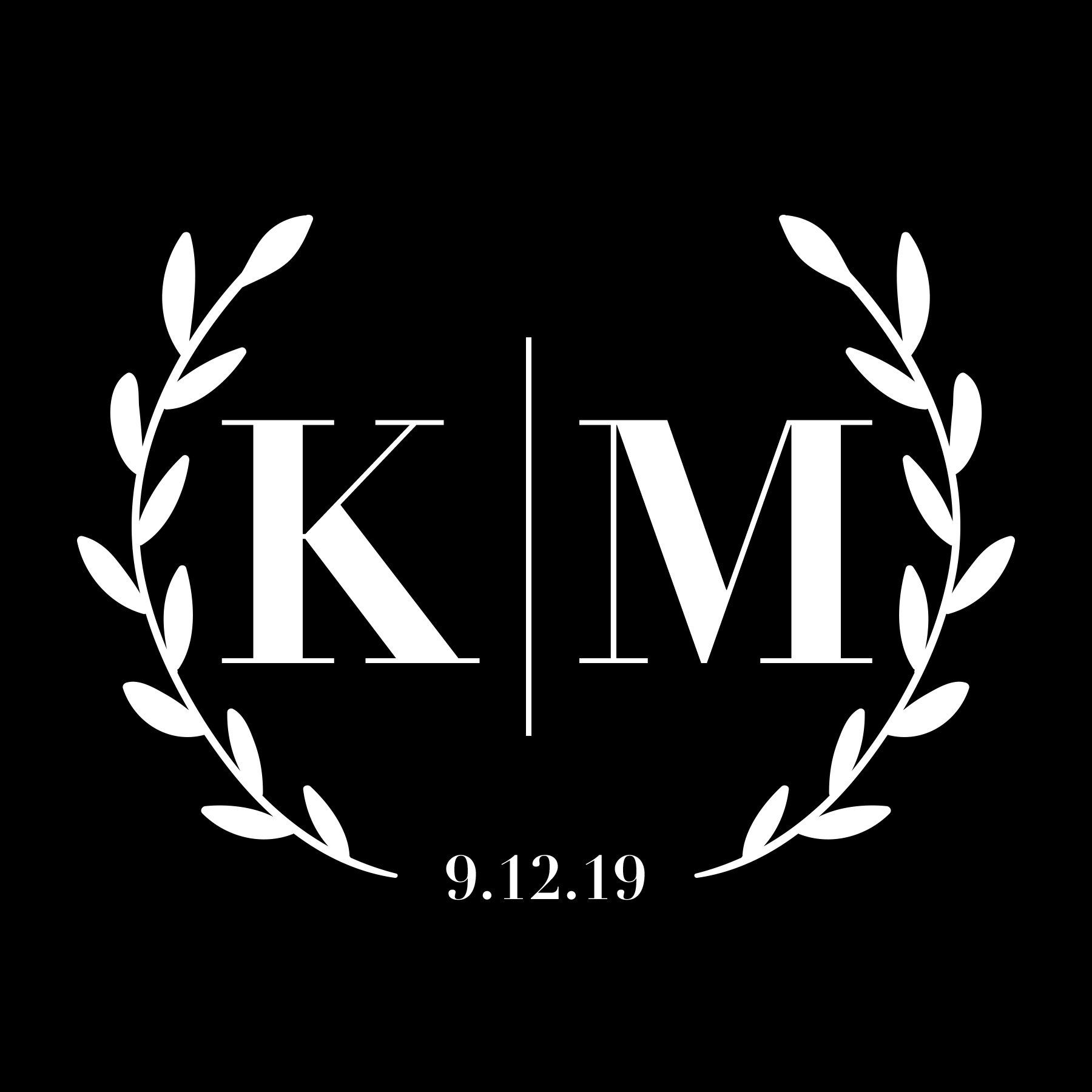 Black monogram logo with K and M in a laurel wreath, separated by a vertical line, date 9.12.19 below