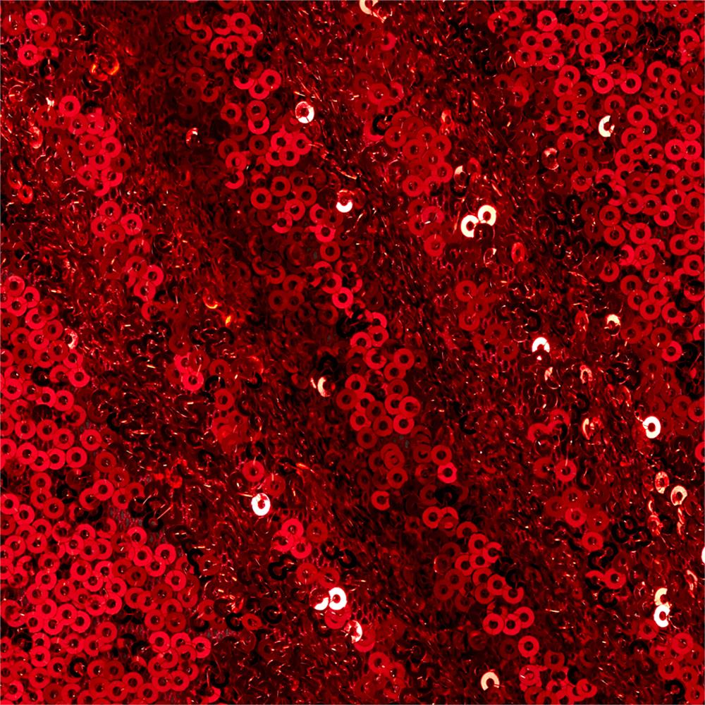 Red sequined fabric with shimmering circular patterns and scattered bright reflections