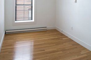 dark polished wooden floorboards