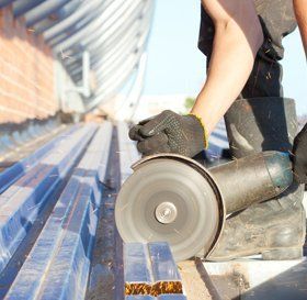 Man cleaning a flat roof
