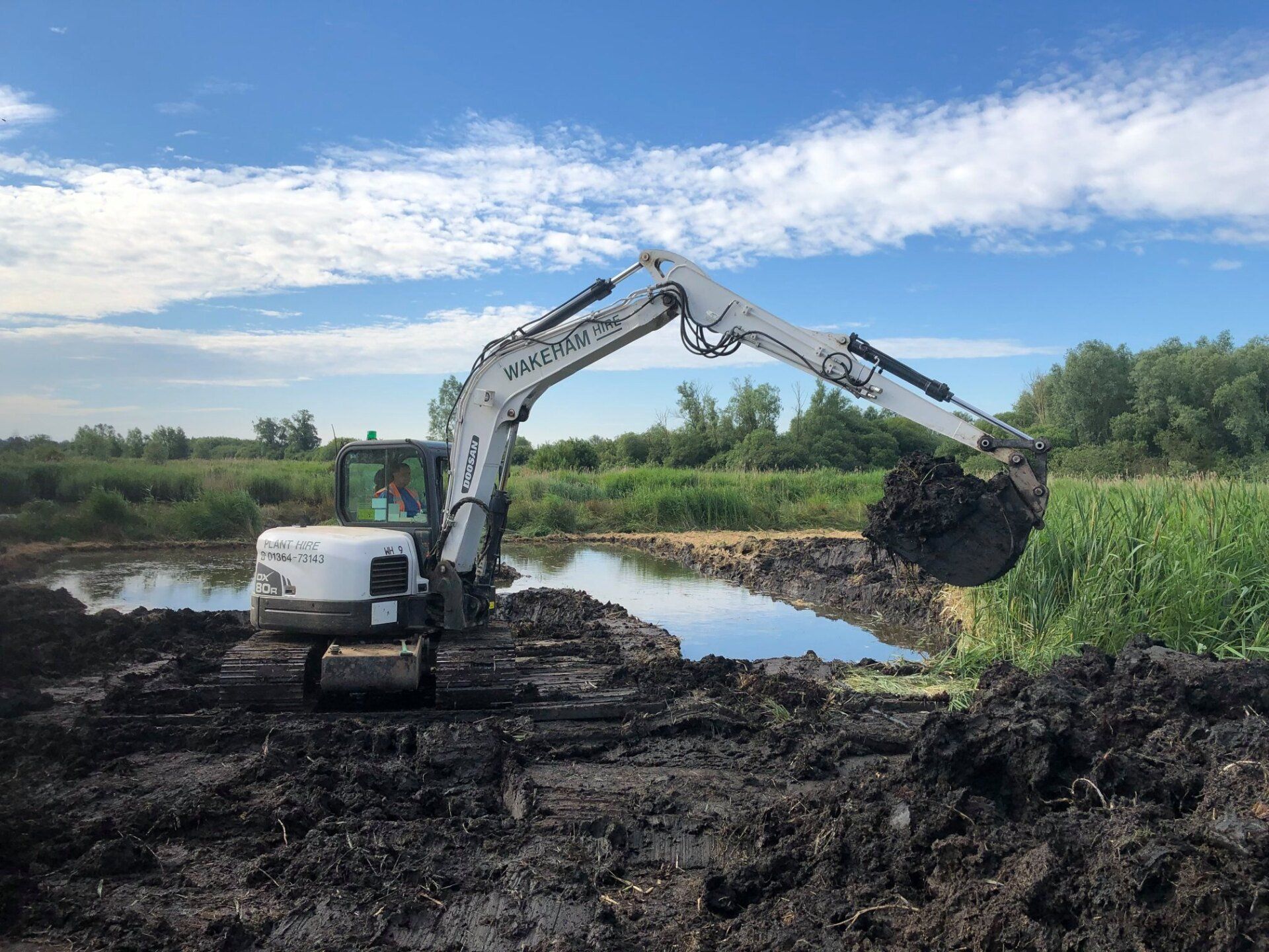 8 tonne excavator at Oulton Broad.