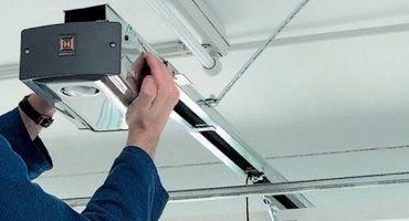 Garage door fitting