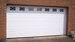 Sectional garage doors