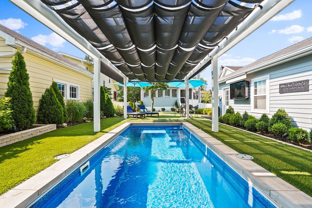 In-Ground Swimming Pool, Patio and Landscaping Installation