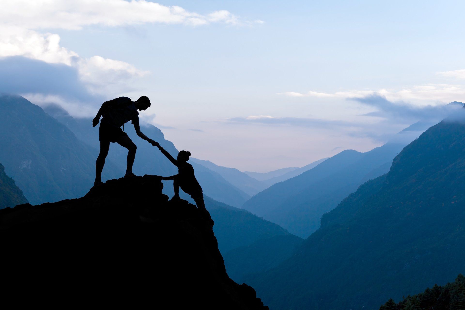 men on the cliff