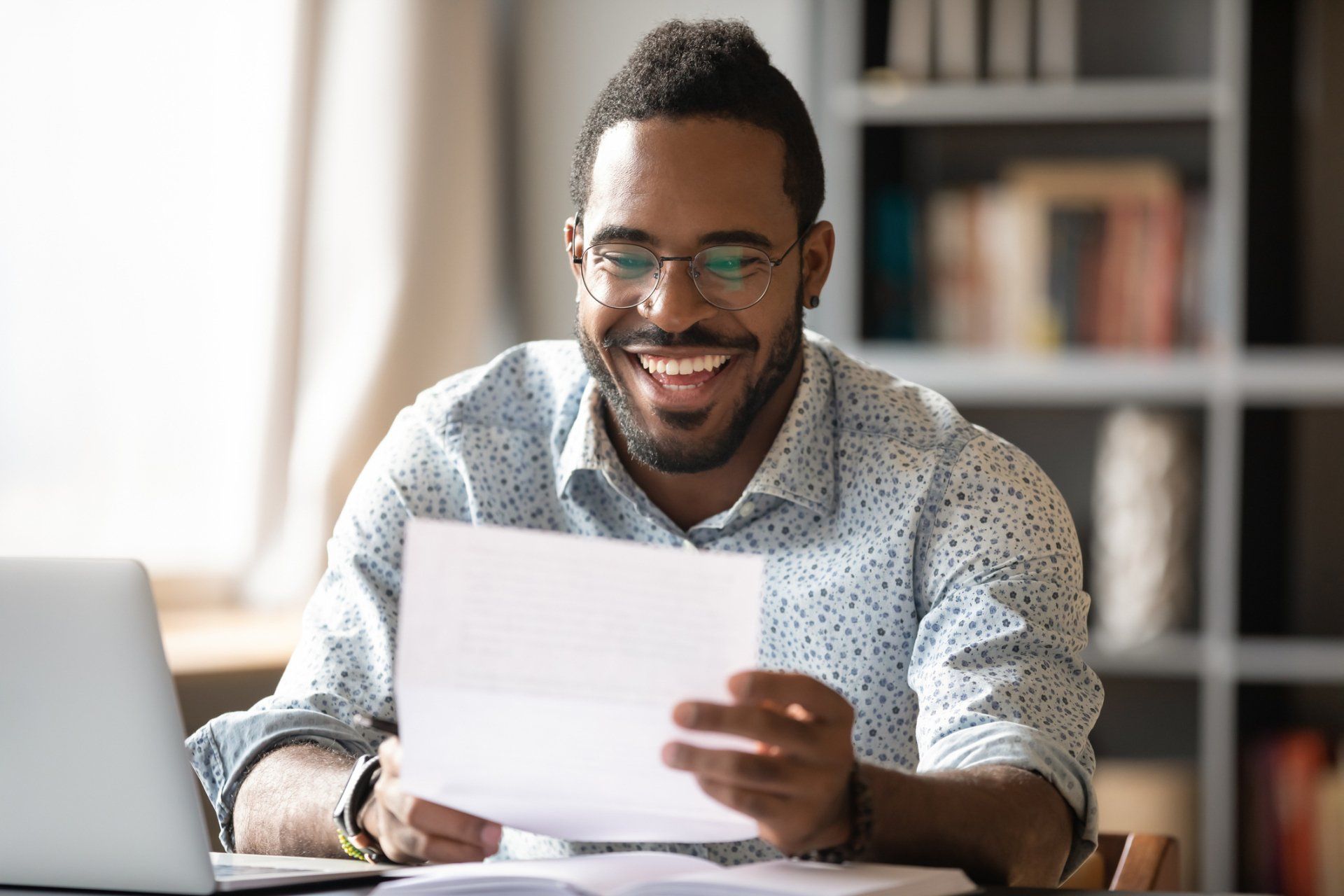 Man Checking Financial Reports | Akon, OH | F. Lee Tax & Accounting Services Inc.