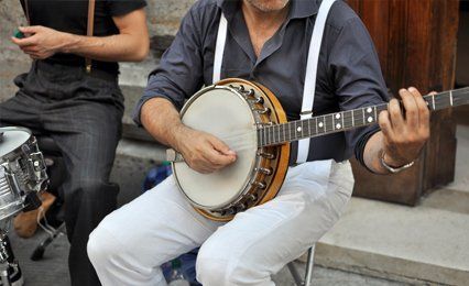 man playing banjo