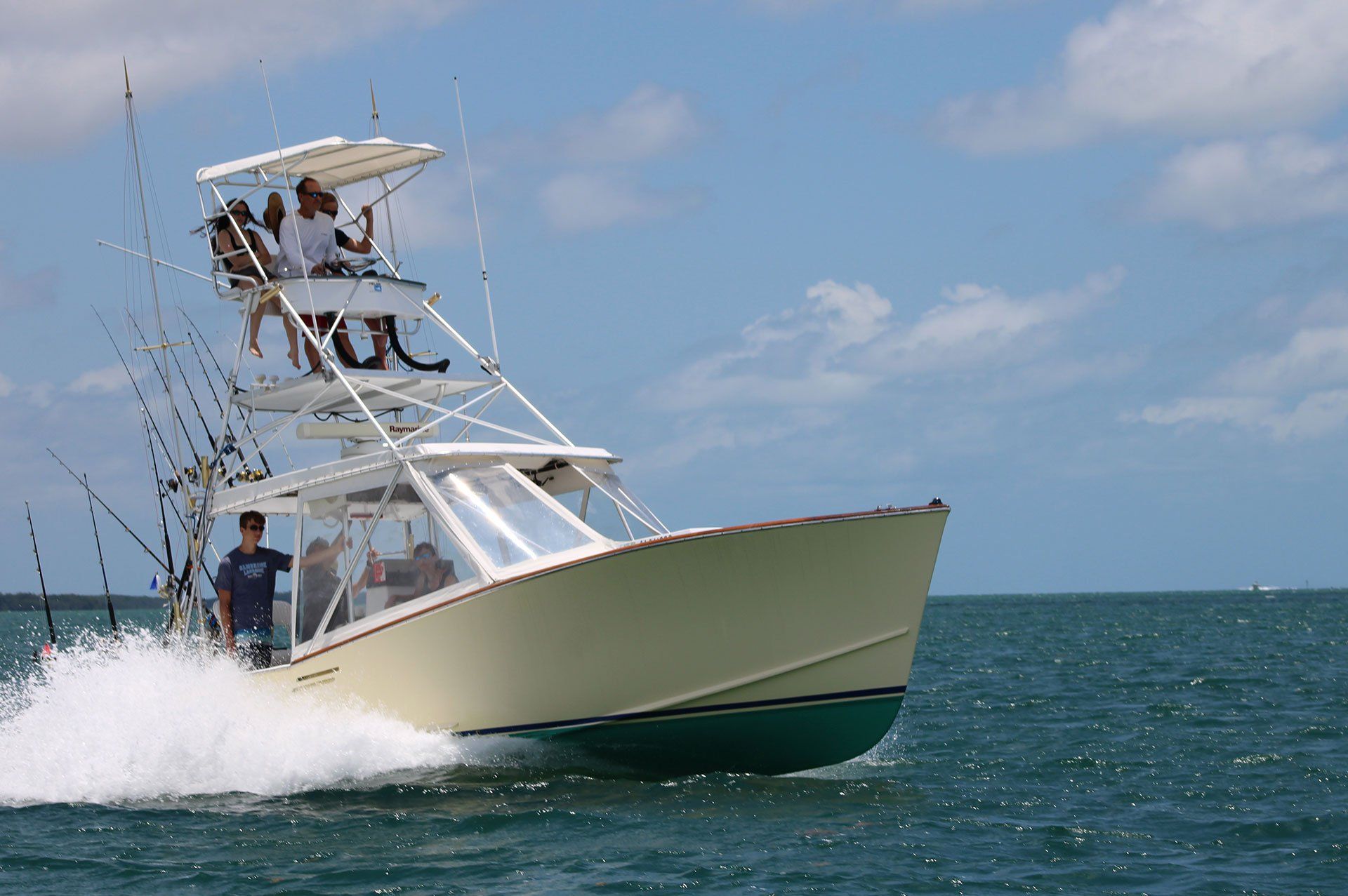 32 foot Gamefisher A boat with a tower on top of it is in the ocean