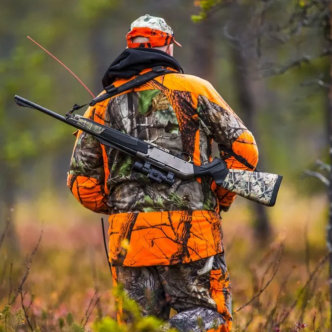 Hearing Protection Hunter In Forest