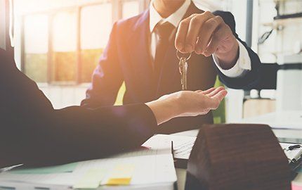 Property Rentals — Agent Giving House Keys To Man In Shiremanstown, PA Property Rentals — Agent Giving House Keys To Man In Shiremanstown, PA