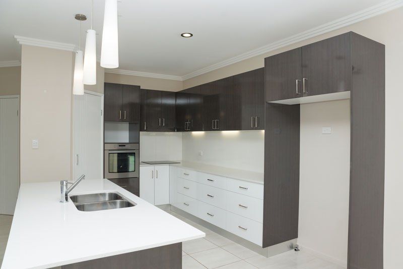 Residential / Commercial Remodeling Company — Modern White Kitchen  in Longview, TX