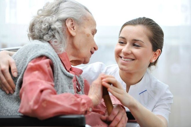 An elderly woman and a nurse - Home Care Service in New Bern, NC