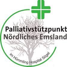 Ein Logo für ein Krankenhaus mit einem Baum und einem grünen Kreuz.