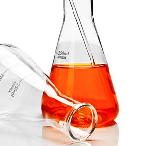 A beaker with 250 ml of orange liquid in it