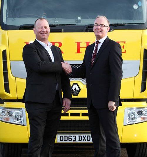 2 partners shaking hands