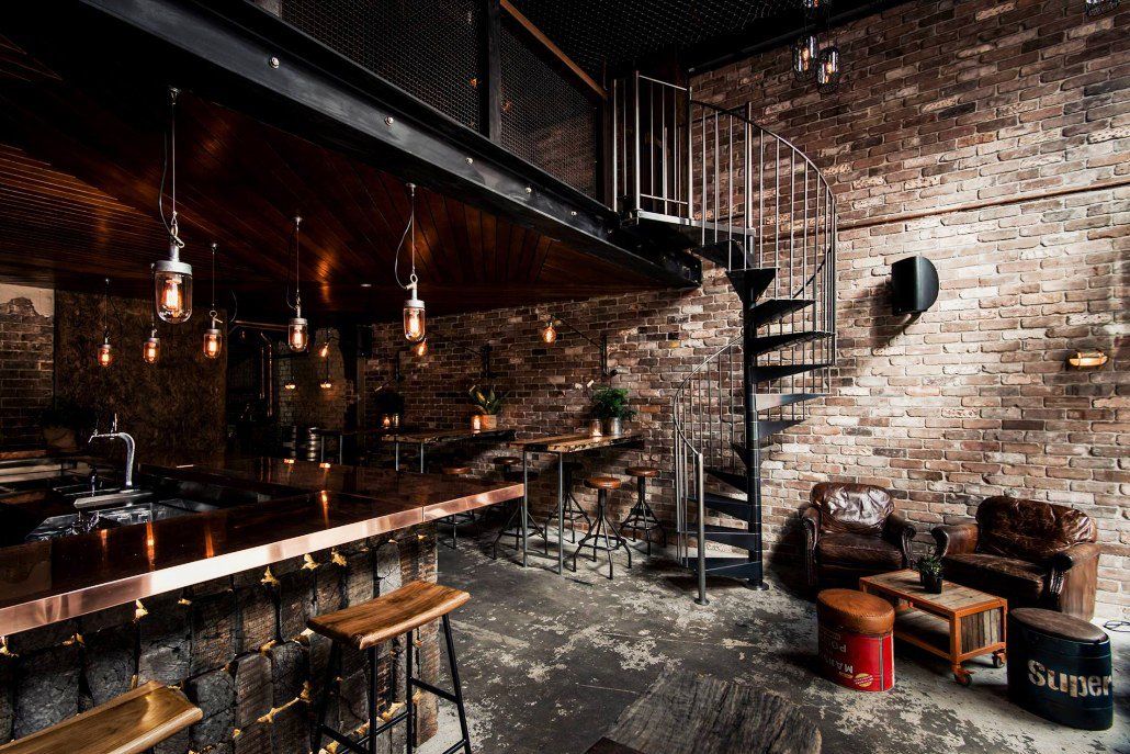 There is a spiral staircase in the middle of the room.