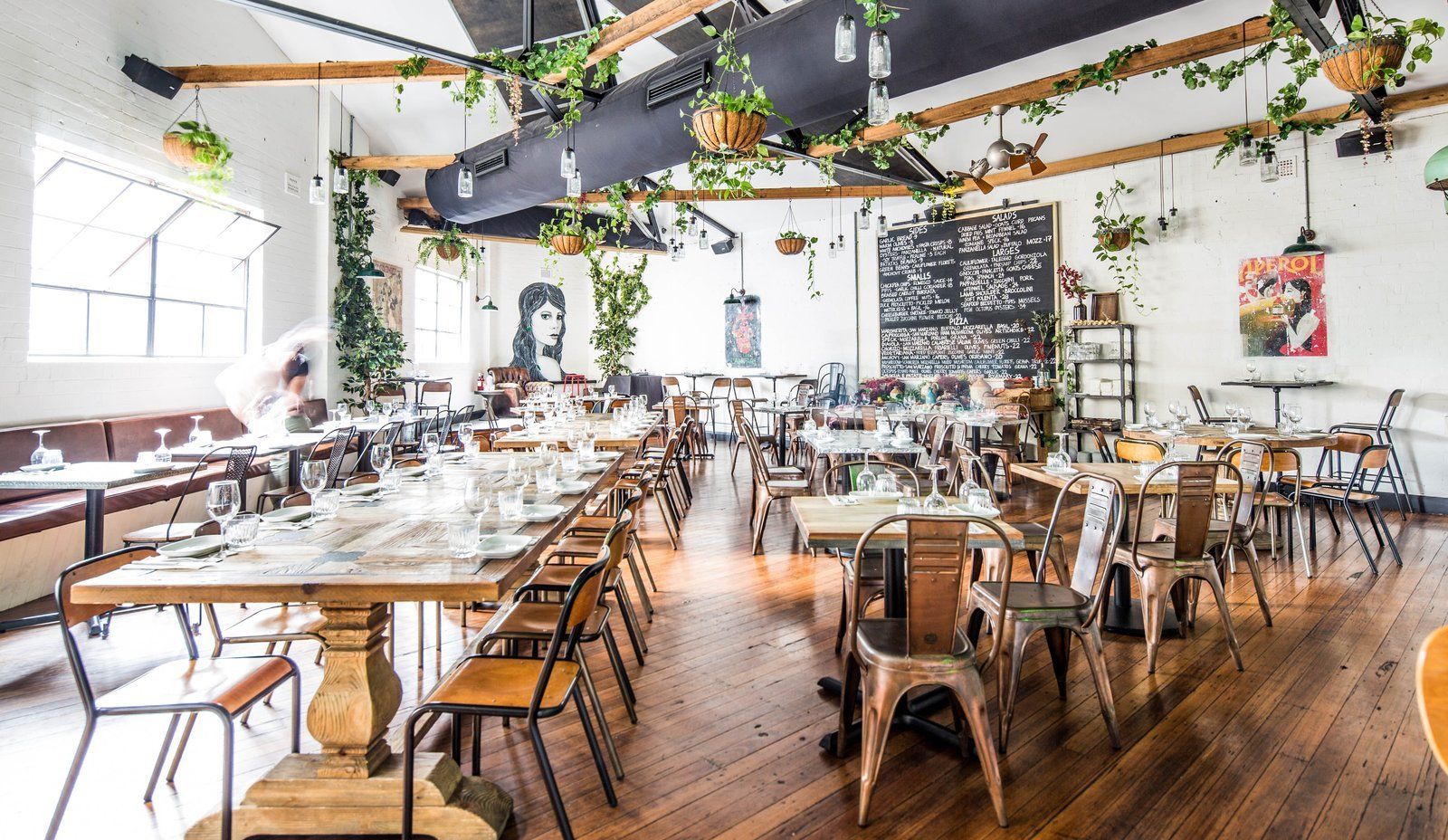 A large dining room filled with tables and chairs.