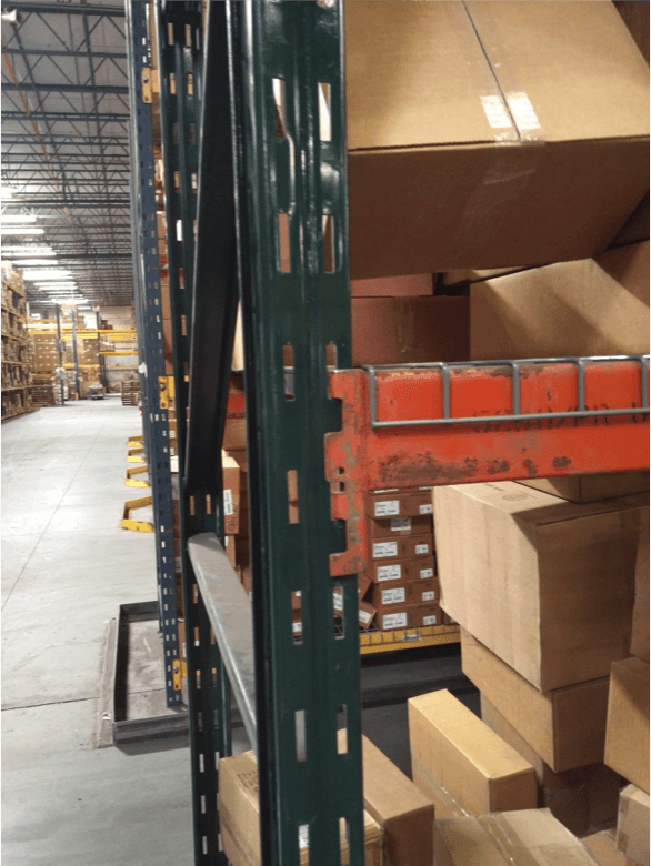 A warehouse filled with lots of cardboard boxes