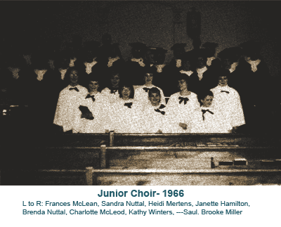 Junior Choir, 1966: a group in white robes stands on church steps at night.