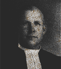 Black-and-white portrait of a man in formal attire, facing forward with a neutral expression.