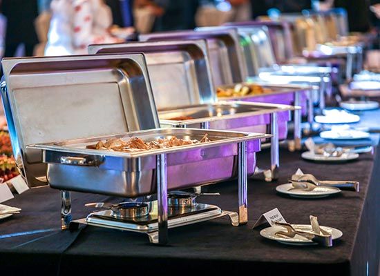 Chafing Dish With Food — Newtown, PA — Piccolo Trattoria Italian Catering Chafing Dish With Food — Newtown, PA — Piccolo Trattoria Italian Catering