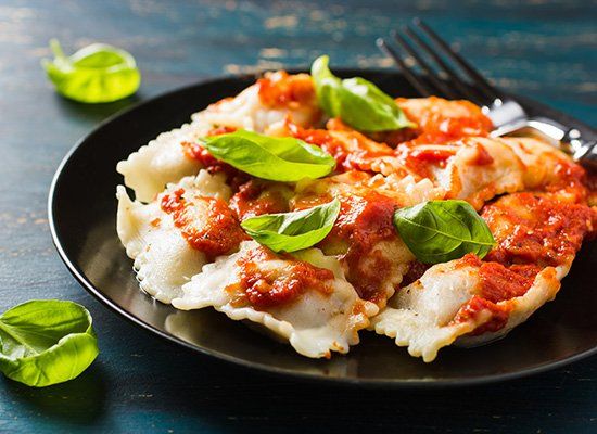 Ravioli With Tomato Sauce — Newtown, PA — Piccolo Trattoria Italian Catering Ravioli With Tomato Sauce — Newtown, PA — Piccolo Trattoria Italian Catering
