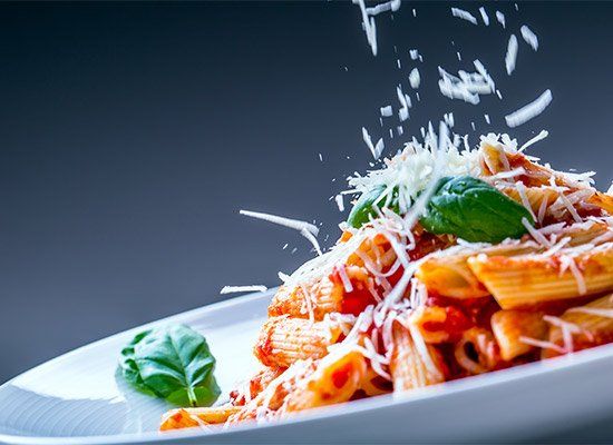 Pasta Penne with Tomato Bolognese Sauce — Newtown, PA — Piccolo Trattoria Italian Catering Pasta Penne with Tomato Bolognese Sauce — Newtown, PA — Piccolo Trattoria Italian Catering