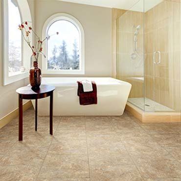 Bathtub And A Wooden Table With Vase — Ypsilanti, MI — Carpet Center & Floors Bathtub And A Wooden Table With Vase — Ypsilanti, MI — Carpet Center & Floors