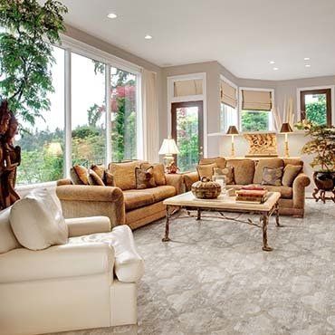 Custom Area Rugs — Elegant Couch With Lamps and Pillows in Ypsilanti, MI