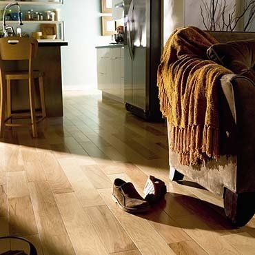 Vinyl Installation — Wooden Floor With Pair Of Shoes in Ypsilanti, MI