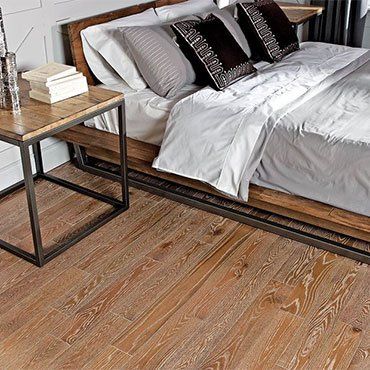 Hardware Installation — Side View Of A Bed with Wooden Frame And Pillow Above in Ypsilanti, MI