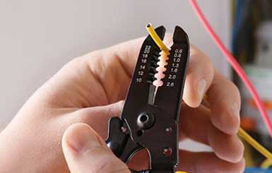 Electrical Wiring cut using electric cutter — Electric Wiring in York, PA Electrical Wiring cut using electric cutter — Electric Wiring in York, PA