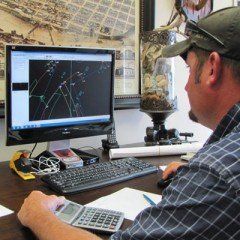 Man Surveying — Columbus, GA — Becker Survey Company Man Surveying — Columbus, GA — Becker Survey Company