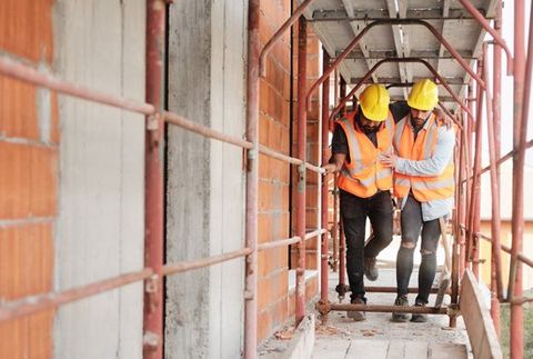 People Working in Construction Site — Bozeman, MT — Buckley Law Office People Working in Construction Site — Bozeman, MT — Buckley Law Office