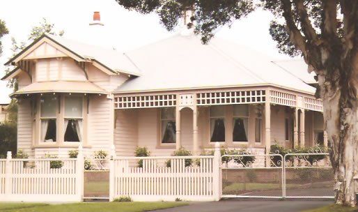 cream colored house with new windows