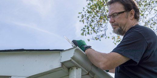 Cleaning the Gutter Guard - Window Cleaning Service in Farmingdale, NJ