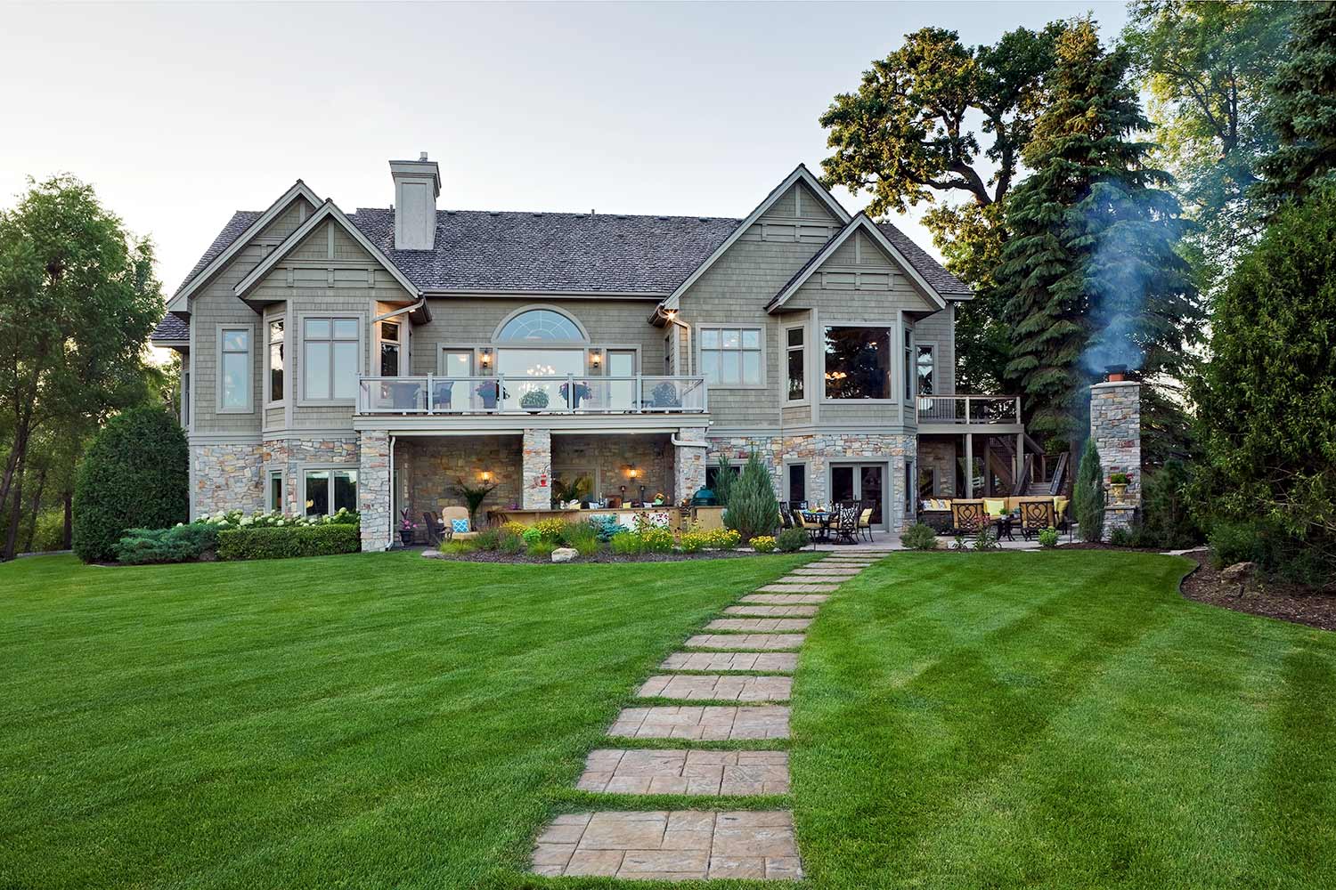 A large house with a walkway leading to it