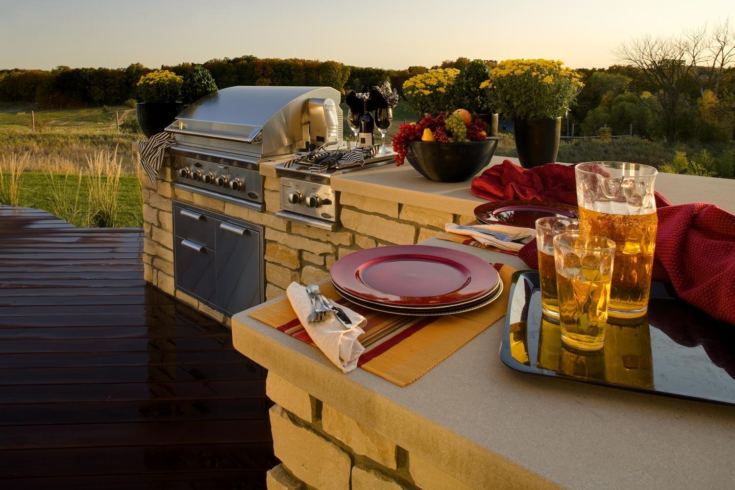 A table with plates and glasses of beer on it