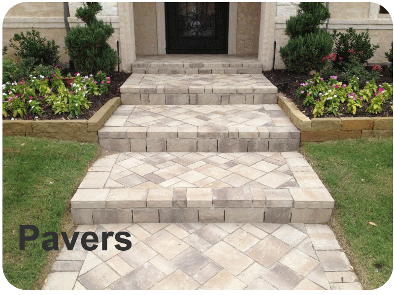 A picture of a pavers walkway leading to a house