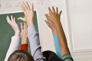 Students answering teacher's questions