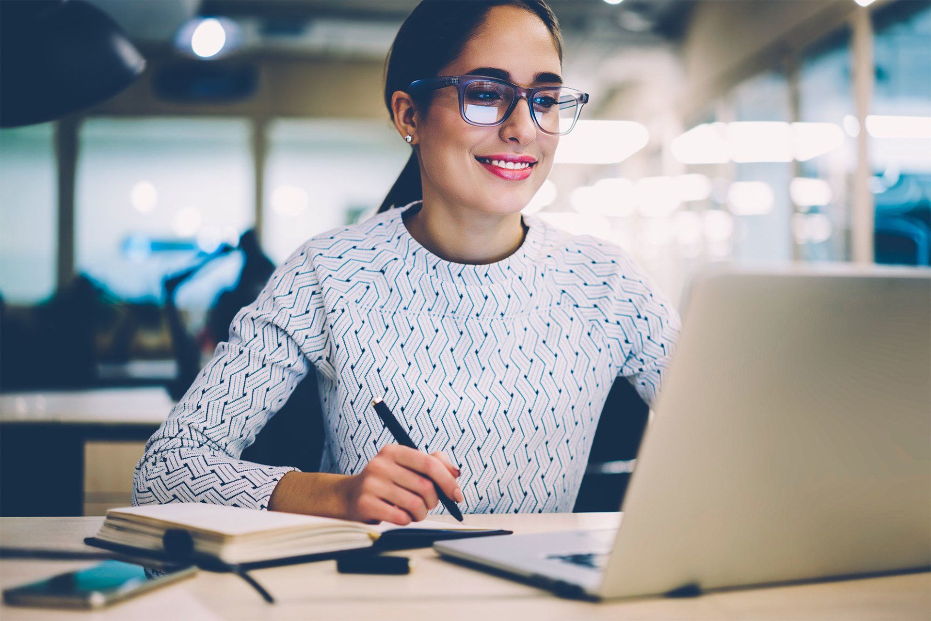 student smiling, studying online