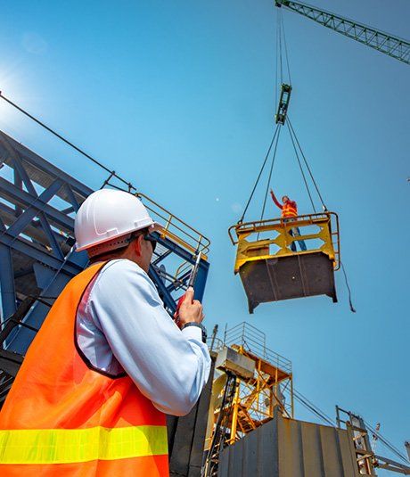 Contractor Instructing the Worker on Crane | Danville, IL | Schomburg & Schomburg Construction Incorporated