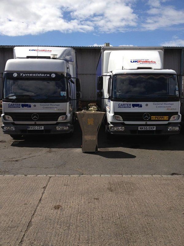 two freight trucks