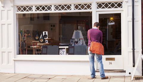 Custom entering a shop with large window