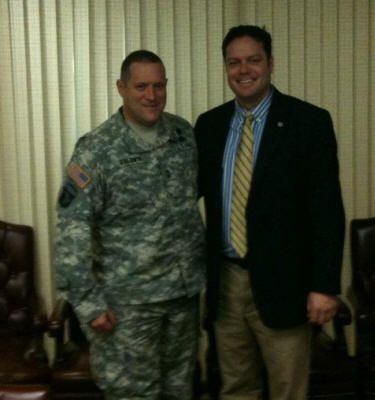MG David Baldwin and NGDC Business Manager Ben Banchs pose for a picture after their June 2011 Meeting at Gov. Jerry Brown's office A man in a suit stands next to a man in a military uniform