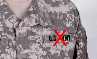 A close up of a person wearing a u.s. army uniform.