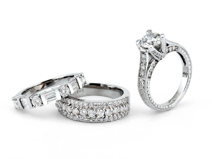 Three diamond rings on white background.