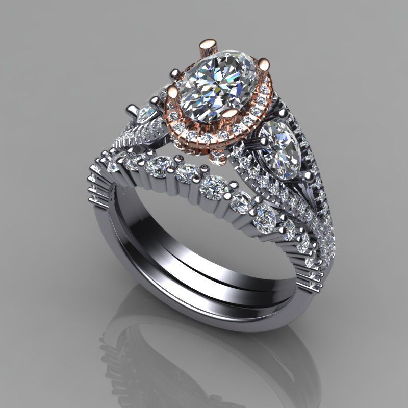Oval diamond ring set with halo and additional diamond bands.